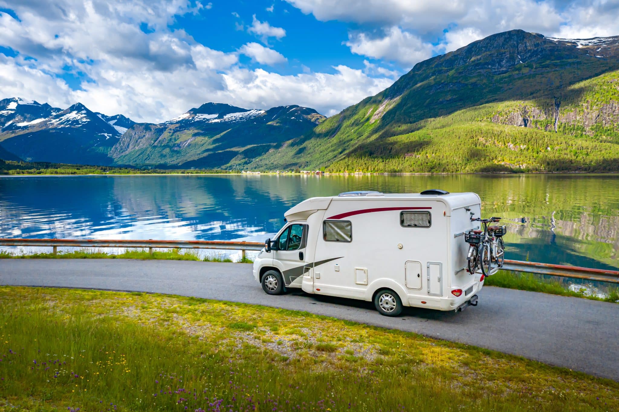 Family vacation travel RV, holiday trip in motorhome, Caravan car Vacation. Beautiful Nature Norway natural landscape.